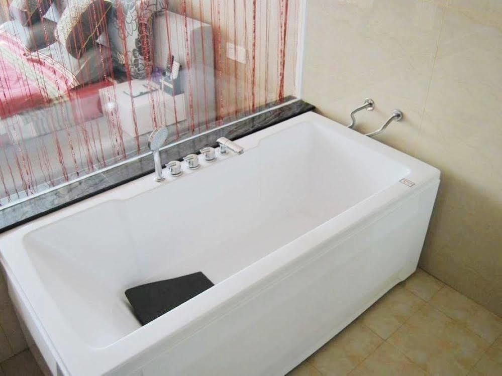 Mo'Er Holiday Hotel Nantong Bagian luar foto