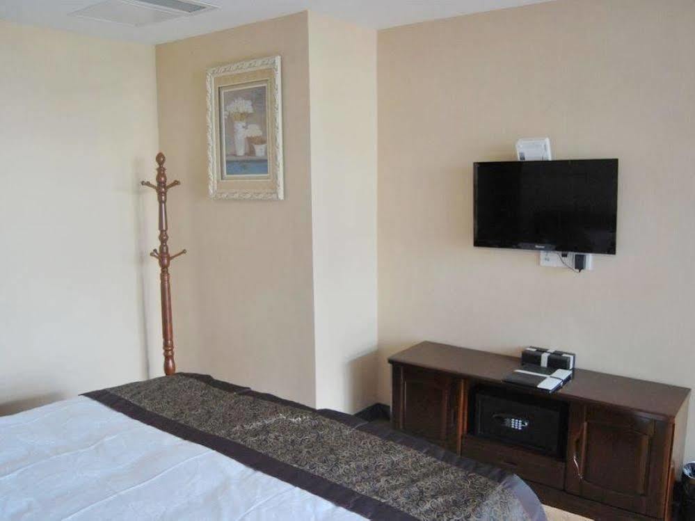 Mo'Er Holiday Hotel Nantong Bagian luar foto